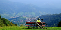 Cyclist taking well earned break, Black Forest, Germany.
