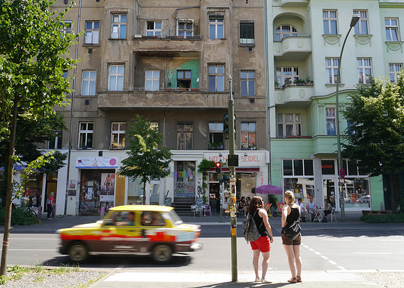 . . two young ladies who  probably don't remember an east and west, and a Trabant that does.