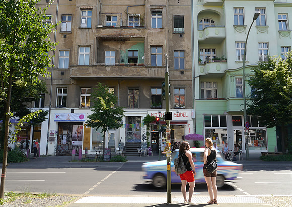 The old and the new. Two apartment blocks in what was East Berlin. One renovated, the other not . .